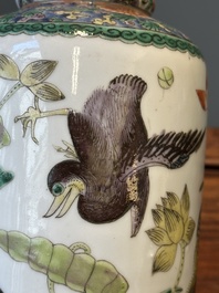 A Chinese famille verte 'mandarin duck and lotus' rouleau vase , 19th C.