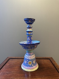 A large Chinese Canton enamel blue-ground 'shou' candlestick, Qianlong/Jiaqing