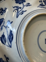 Four Chinese blue and white lobed 'phoenix and monkey' plates, flower mark, Kangxi