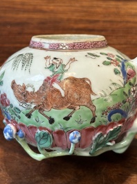 A pair of Chinese famille rose 'boy and buffalo' teapots, Yongzheng