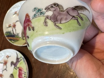 A pair of Chinese famille rose cups and saucers with horses, Yongzheng