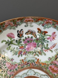 A pair of Chinese Canton famille rose monogrammed plates and a large '100 butterflies' tray, 19th C.