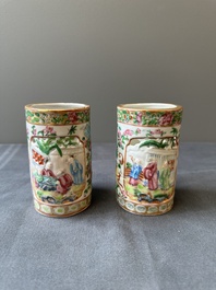 A pair of Chinese reticulated Canton famille rose brush pots, 19th C.