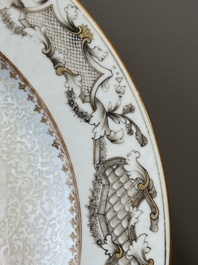 A Chinese grisaille armorial dish and two plates for the Dutch, English and Scottish markets, Qianlong