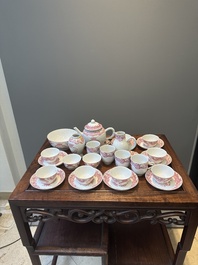 A 28-piece Chinese puce-enamelled and gilt armorial tea service with crowned monograms, Qianlong