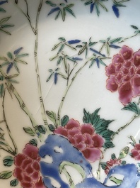 Nine Chinese famille rose cups and eight saucers, Yongzheng/Qianlong