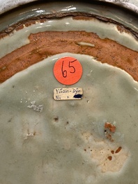 A Chinese Longquan celadon dish with floral anhua design, Ming