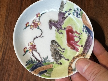 A pair of Chinese famille rose cups and saucers with horses, Yongzheng
