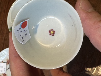 A pair of Chinese famille rose cups and saucers with horses, Yongzheng
