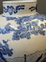 A pair of Chinese blue and white covered vases with figural design, 19th C.