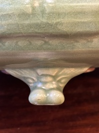 A Chinese Longquan celadon tripod censer on wooden stand, Yuan/Ming