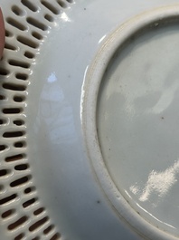An oval Chinese Canton famille rose dish with a reticulated border, 19th C.