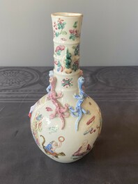 A Chinese famille rose '18 Luohan' bottle vase, 19th C.