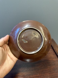 Five Chinese slip-decorated brown-glazed 'bird on blossoming plum tree' plates, Fujian kilns, late Ming, 16/17th C.