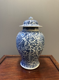 A Chinese blue and white 'lotus scroll' vase and cover, Kangxi