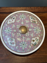 A Chinese iron-red-decorated covered bowl and a famille rose covered bowl, 19th C.