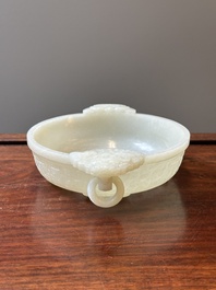 An important Chinese chrysanthemum-shaped very pale celadon jade marriage bowl, 18th C.