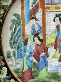 A pair of Chinese monogrammed Canton famille rose plates with black-glazed rims, 19th C.