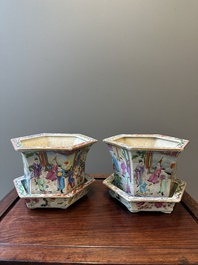 A pair of hexagonal Chinese Canton famille rose jardinieres on stands, 19th C.