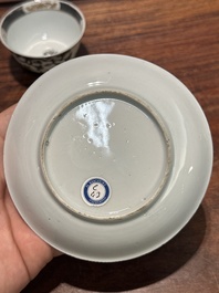 A pair of Chinese grisaille and gilt 'pheasant' cups and saucers, Yongzheng