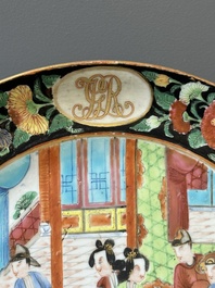 A pair of Chinese monogrammed Canton famille rose plates with black-glazed rims, 19th C.