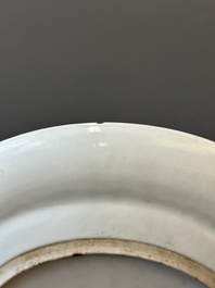 A pair of Chinese monogrammed Canton famille rose plates with black-glazed rims, 19th C.
