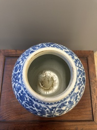 A Chinese blue and white 'lotus scroll' vase and cover, Kangxi