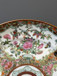 A pair of Chinese Canton famille rose monogrammed plates and a large '100 butterflies' tray, 19th C.