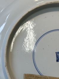 A Chinese blue and white 'antiquities' dish, Kangxi
