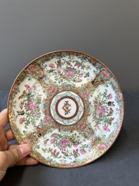A pair of Chinese Canton famille rose monogrammed plates and a large '100 butterflies' tray, 19th C.