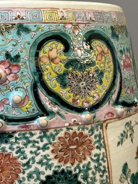 A Chinese famille rose garden seat with birds among blossoming branches, 19th C.