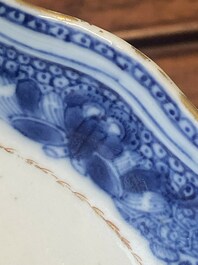 Een Chinese famille rose kop en schotel met wapendecor, Qianlong