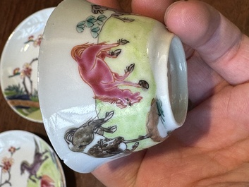A pair of Chinese famille rose cups and saucers with horses, Yongzheng