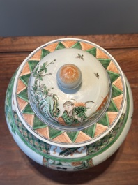 A Chinese famille verte covered vase and a bottle vase, 19th C.