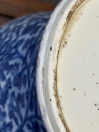 A Chinese blue and white 'lotus scroll' vase and cover, Kangxi