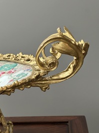 A Chinese famille rose 'flower basket' dish with gilt bronze mount, Yongzheng