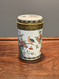 A Chinese famille verte cylindrical box and cover with gilt bronze mount, Kangxi