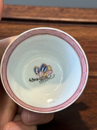 Nine Chinese famille rose cups and eight saucers, Yongzheng/Qianlong