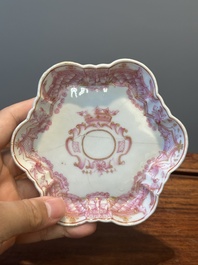 A 28-piece Chinese puce-enamelled and gilt armorial tea service with crowned monograms, Qianlong