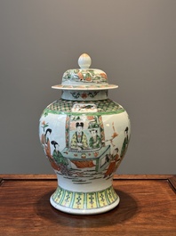 A Chinese famille verte covered vase and a bottle vase, 19th C.