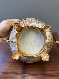 A Chinese Canton famille rose reticulated basket on stand and a bowl with gilt bronze mounts, 19th C.