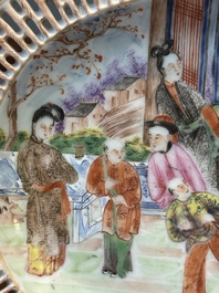 An oval Chinese Canton famille rose dish with a reticulated border, 19th C.