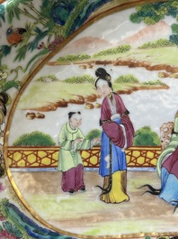 A Chinese Canton famille rose lobed armorial dish and a plate, 19th C.
