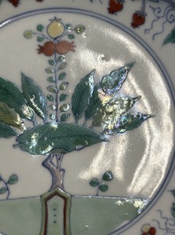 A Chinese doucai plate with pomegranates, plums and grapes, Chenghua mark, Kangxi