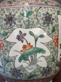 A Chinese famille verte covered vase and a bottle vase, 19th C.