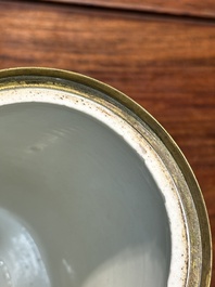 A Chinese famille verte cylindrical box and cover with gilt bronze mount, Kangxi