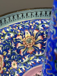 A large Chinese Canton enamel blue-ground 'shou' candlestick, Qianlong/Jiaqing