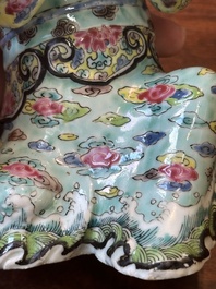 A Chinese famille rose figure of a lady with a bowl, Yongzheng