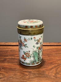 A Chinese famille verte cylindrical box and cover with gilt bronze mount, Kangxi