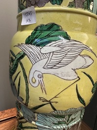 Paire de vases de forme 'gu' en biscuit &eacute;maill&eacute; verte mont&eacute;s en lampes en bronze dor&eacute;, Chine, 19&egrave;me